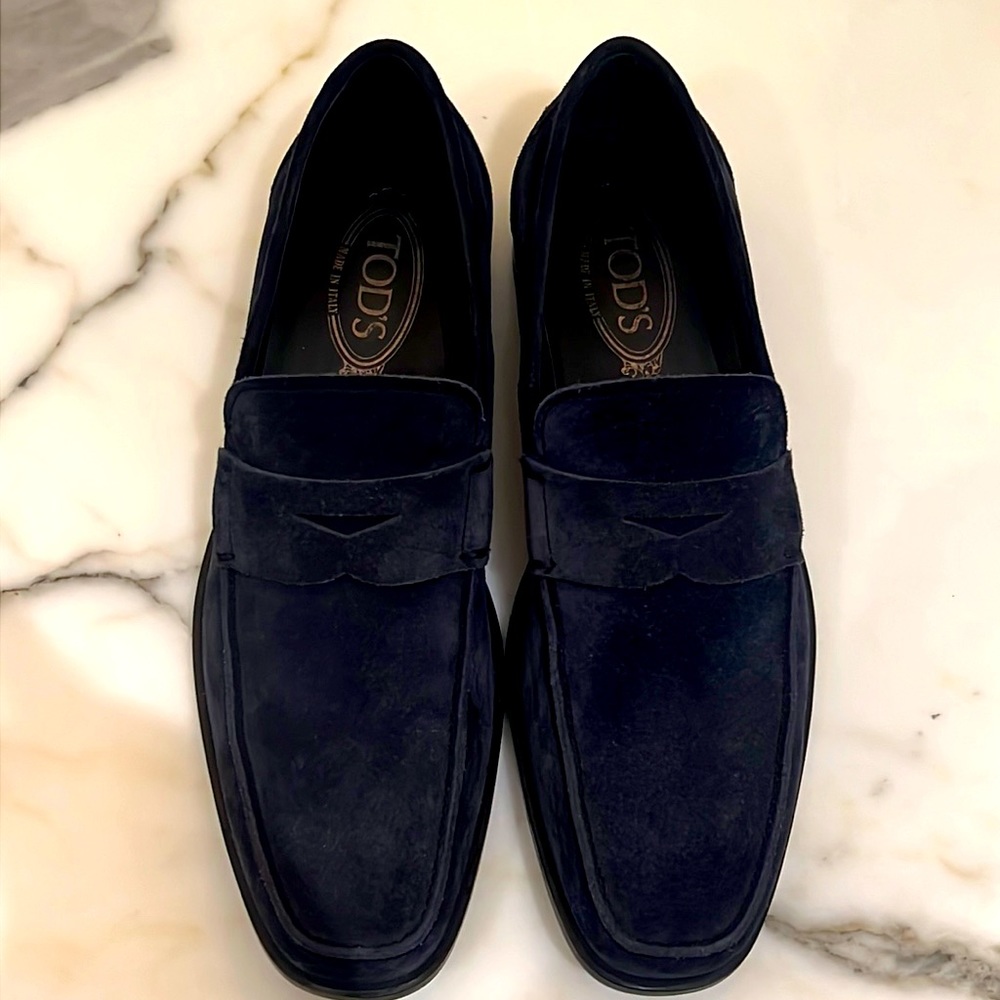 TOD’s navy suede loafers